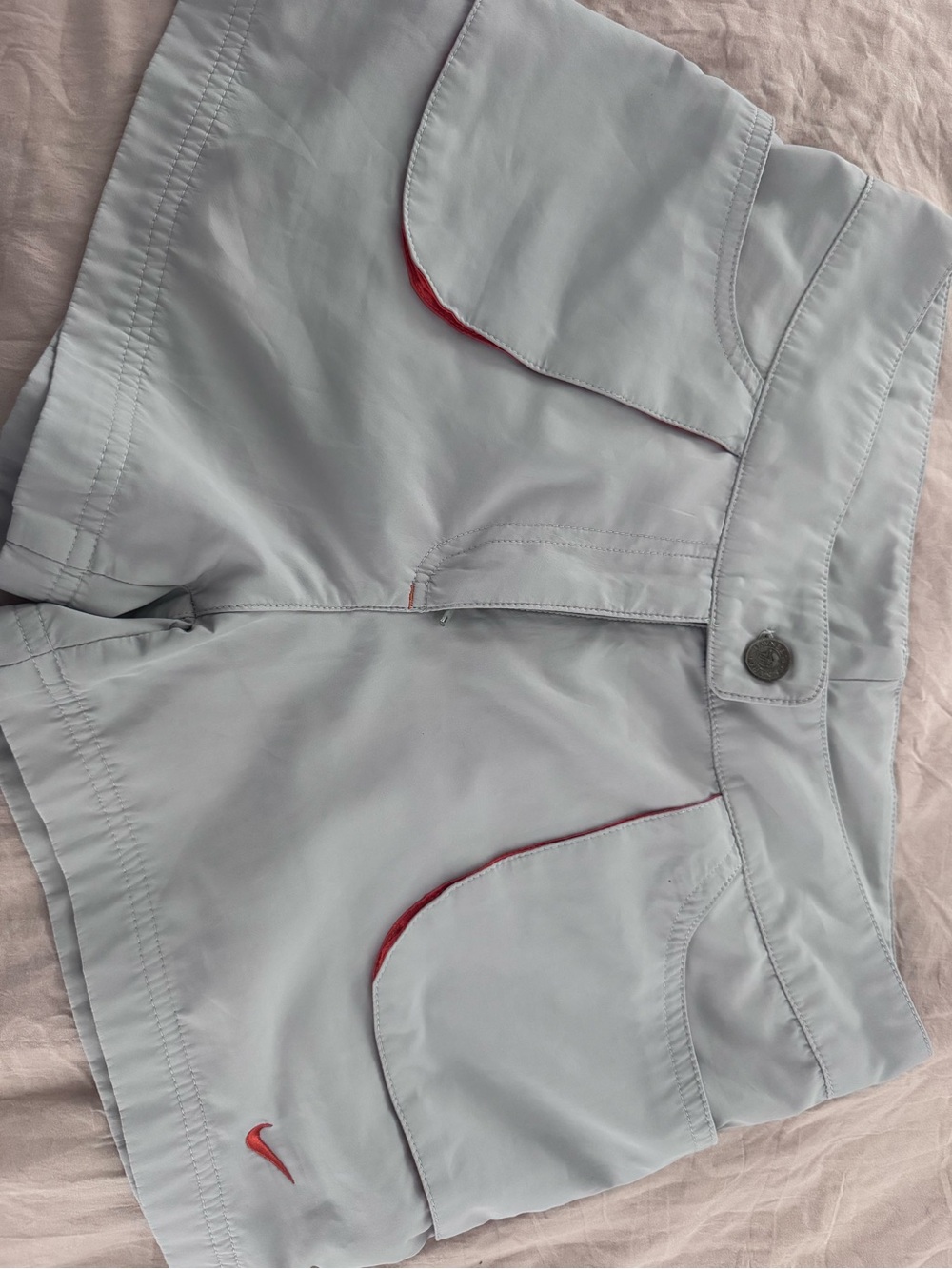 Nike Women's Light Gray Athletic Shorts with orange trim